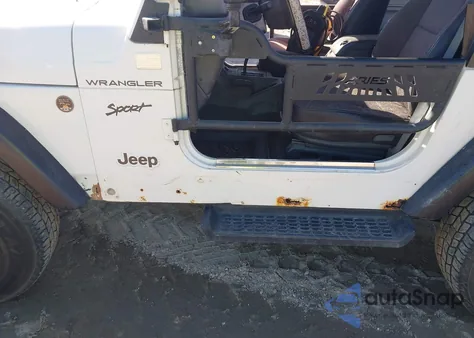 2002 Jeep Wrangler Sport z USA, uszkodzony, nr VIN 1J4FA49S72P750700